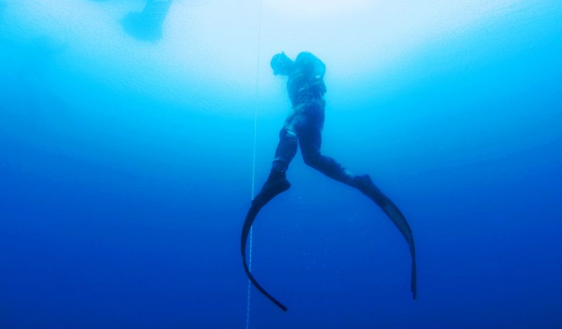 Freediver ascending to the surface