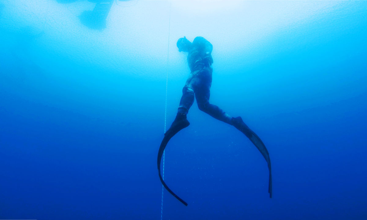 Freediver ascending to the surface